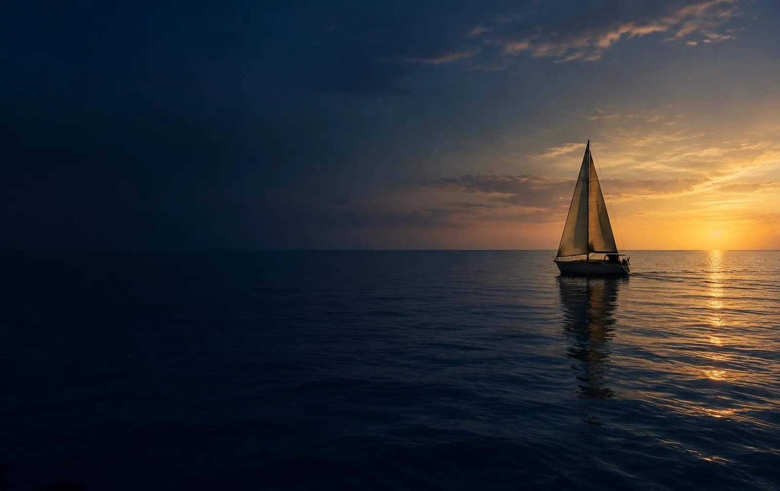 Veleiro no mar ao entardecer, símbolo de planejamento de longo prazo